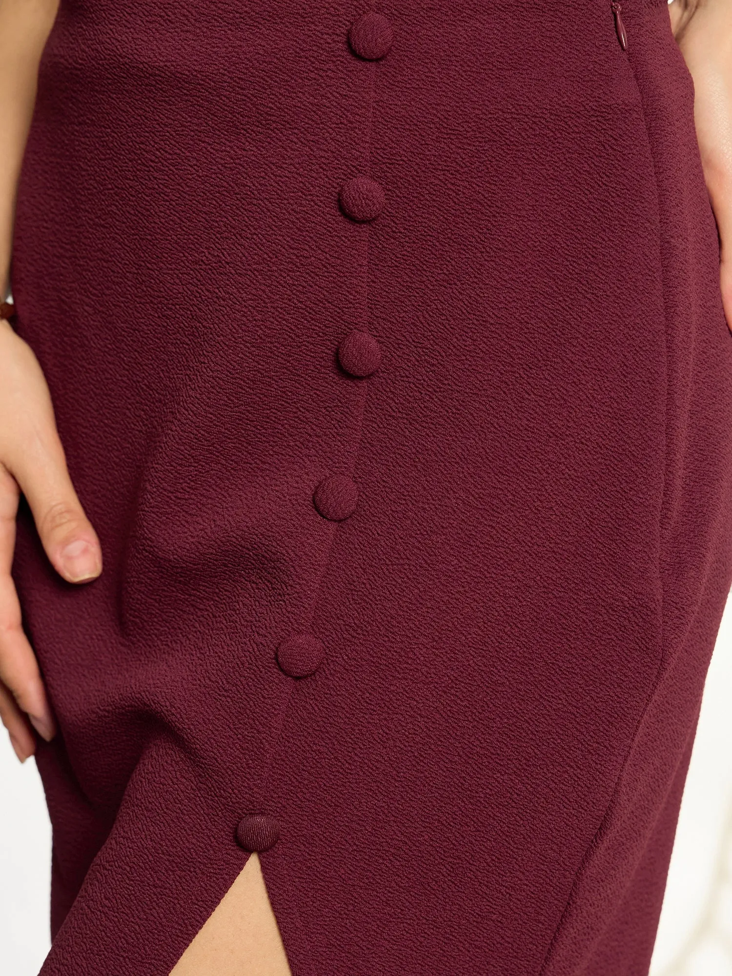 Berrylush Women Solid Maroon High-Rise Waist Front-Slit Straight Hem Button Embellished A-Line Mini Skirt